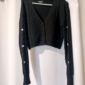 Wild Fable knitted, cropped sweater. Size Medium. Black with floral design.